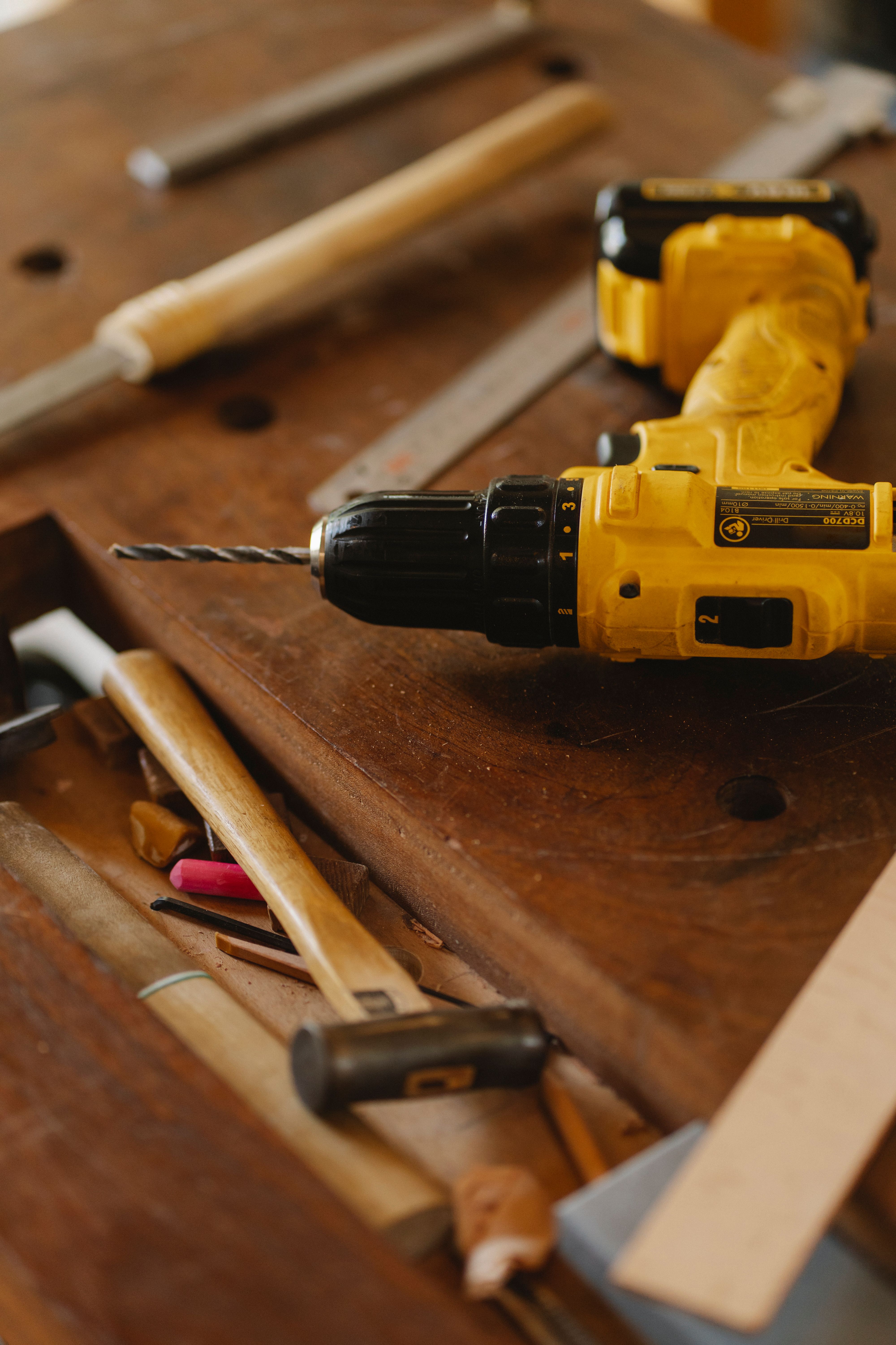 Collection of power tools including drills and saws