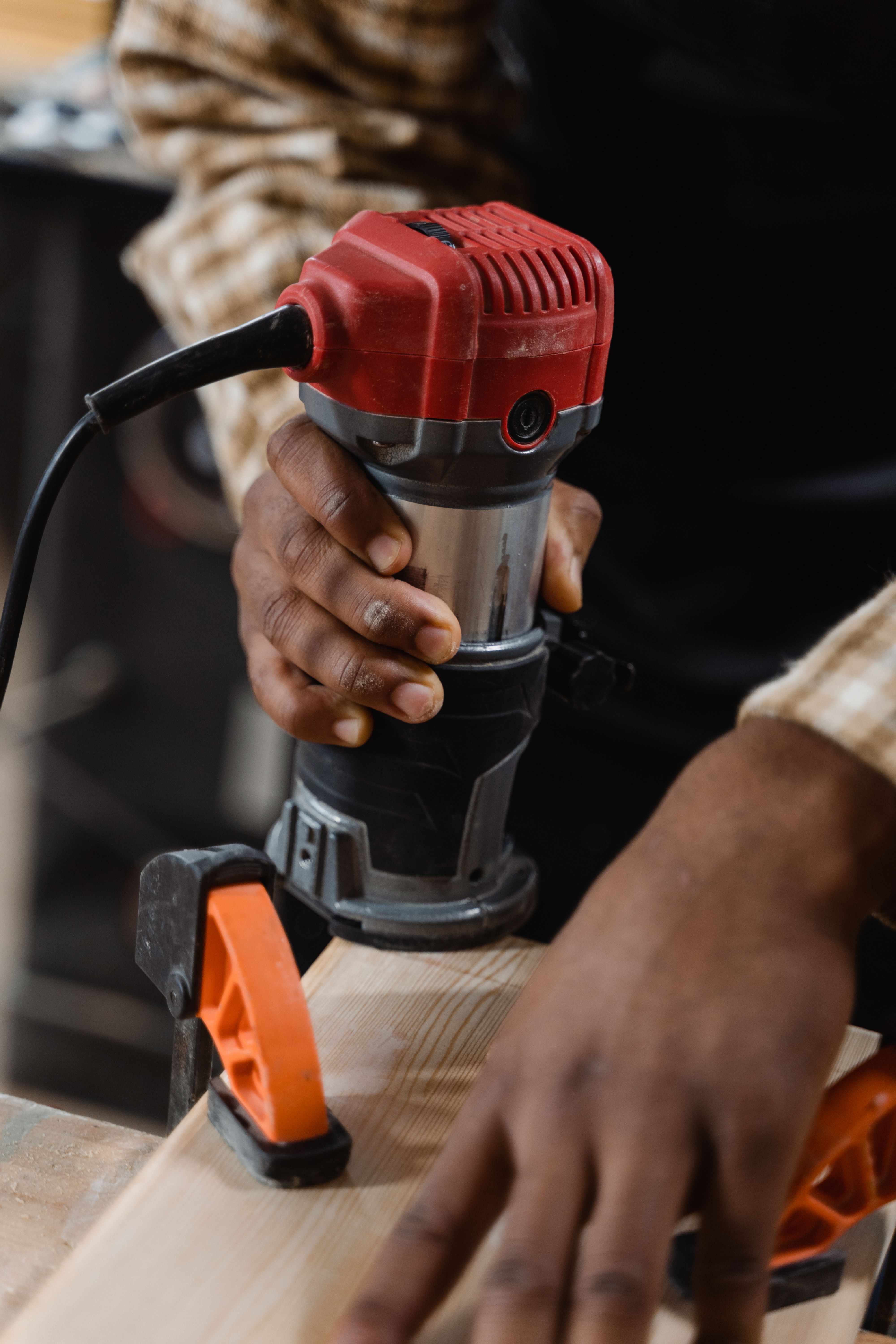 Quality inspection process showing careful examination of tools before sale